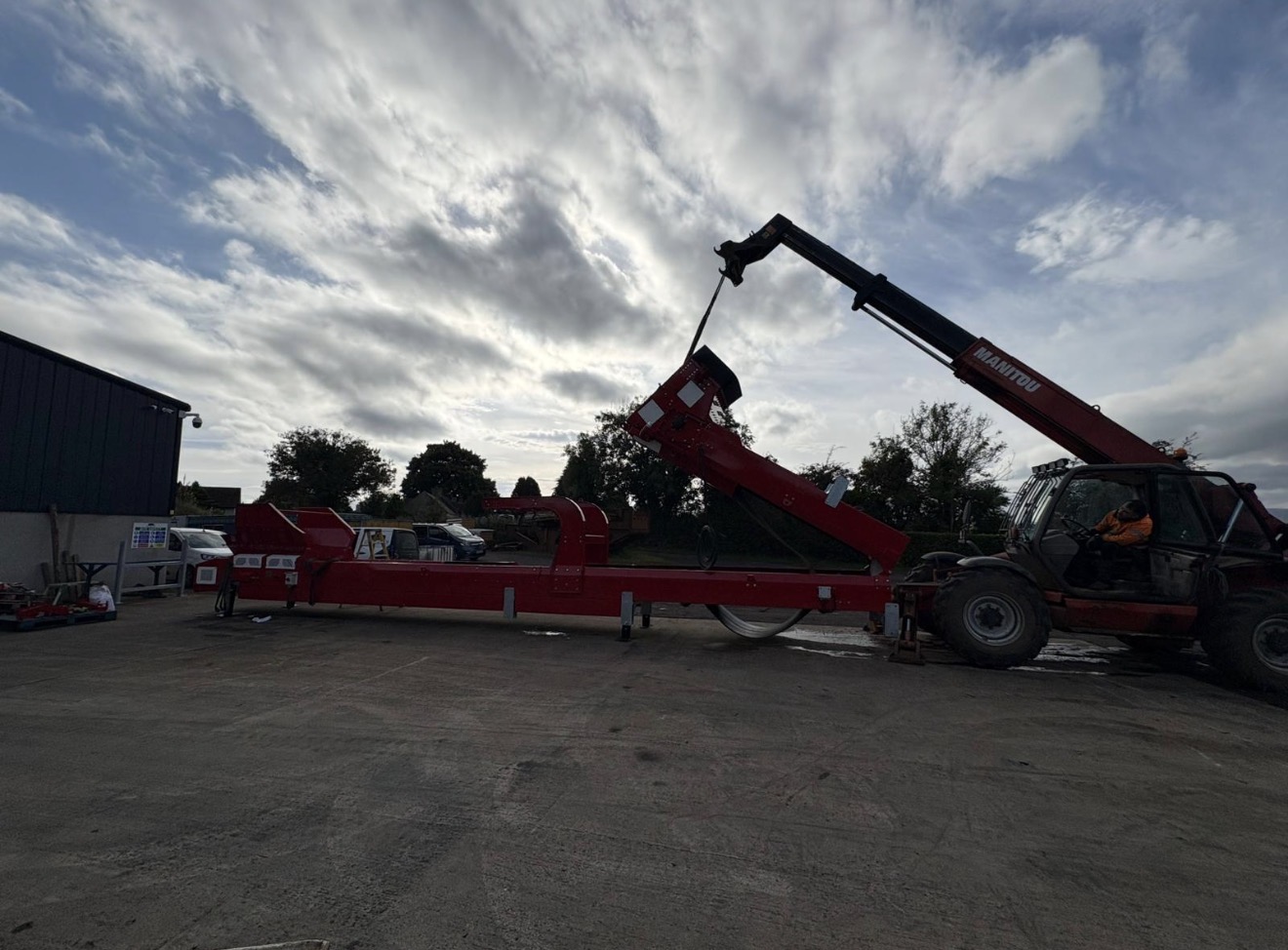 Custom fabricated bespoke steel machinery being craned into position on site